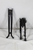 Two rifle bipods. One metal fixed and one plastic barrel grab spring loaded. Like new.