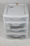 One small four compartment storage box with reloading parts.
