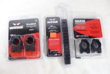 Two sets of Warne rail mount rings and one Warne bolt down rail. New in packages.