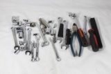 Miscellaneous sockets and handle, wire cutters and two driver handle's. Used.