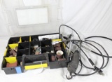 One Dremel tool and table stand, used and on Stanley plastic storage box with Dremel tool