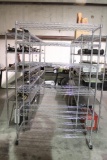 Heavy duty metal shelves. 6 feet x 4 feet. 6 racks. This one is on rollers.