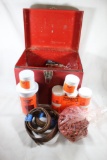 Large metal box with large amount of tannerite, and leather working accessories.