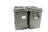 Two large plastic ammo cans and two smaller plastic ammo cans.