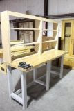 Heavy duty reloading bench with large upright shelving and vice and a Besset flat vise. Used in good