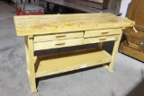Wood reloading bench with vice. Heavy duty. Has some staining.