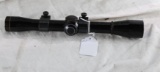 One Leupold M8-4X x 20 with Weaver rail mount rings. Used.