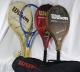 One Wilson nylon multi racket carry bag with three Wilson tennis rackets in Wilson racket covers and