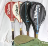 One Wilson nylon multi racket carry bag with (5) Wilson tennis rackets in Wilson racket covers.