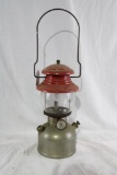 One Coleman single mantle white gas lantern. Used in fair condition. May need some work, but appears