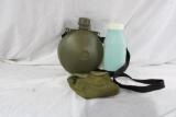 One US green plastic round canteen, one canvas canteen cover and one plastic US 1 liter bottle. Used