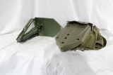 Old green U.S military canvas bag with U.S. military folding shovel. Used.
