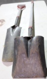 One wood handle shovel and one wood handle spad. Used.