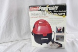 One 12 volt Coleman wet/dry vacuum. Like new in box.