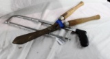 One hacksaw with blade and one wood handled hedge trimmers. Used.