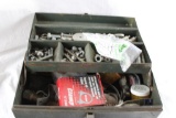 One green ,metal tool box with miscellaneous tools and nuts and bolts. Used.