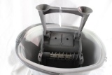 One plastic commercial mop bucket with squeeze/drainer. Used in good condition.