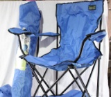A pair of nylon folding chairs and nylon bags. Used.