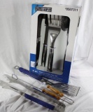 One Master Forge 4 piece stainless grill set new in package and a extra spatula and two extra tongs.