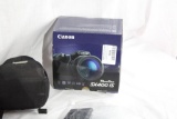 One Canon PowerShot camera. Like new in box.