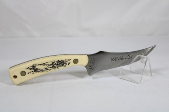 Schrade Scrimshaw Series Sharp Finger skinner with 3.5 inch blade and scrimshawed scene on synthetic