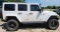 2014 4 door Jeep Wrangler Rubicon. White rhino line paint. 34, 400 miles. Aftermarket bumpers, Warn