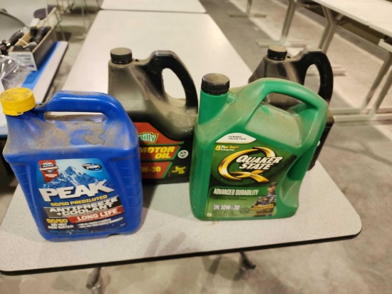 3 partial gallons of 10W-30 oil and 1 gal of prediluted antifreeze
