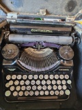 Antique continental type writer in case