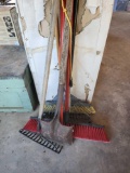 Manual pole saw, 2 rakes, shop broom and shovel