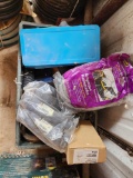 Plastic crate of various items, includes peg board hangers, misc tools