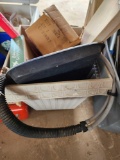 Two plastic flower pots with miscellaneous hoses, pan, cards ect