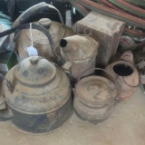 Four old tea kettles