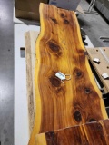 2 live edge wood slabs 1 cedar approximately 48x14, the other is 7 ft long possibly untreated oak