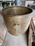 Large brass pot with stirrer