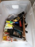 Tub of misc item, including motor oil, Dewalt grinder, water trough float and old leather chaps