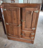 Antique oak refrigerator made by Illinois Refrigerator co.