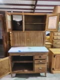Wood Hoosier style cabinet with enamel pullout counter