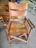 Wood frame rocker with leather seat and back