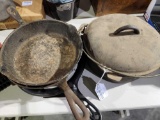 Cast iron pans, includes Dutch oven, corn bread pan and small skillet