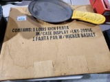 Fajita pan with wicker basket in box and one cast-iron pan