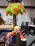 Paper machete parachuting clown