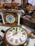 One standing mantle clock with lion and a hanging 