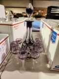 3 boxes of glassware, one box of Red bohemian with decanter, pitcher and 5 glasses.one set of