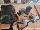 Minolta 35 mm camera and lens with bag