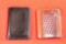Two badge wallets, one black leather and one tan leather basket weave