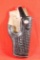 Black tooled leather right handed belt holster with snap trigger loop for small revolver, Elk hide