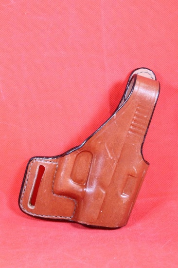 Bianchi # 75 brown leather right handed high loop holster for Glock 17 -19. Like new.
