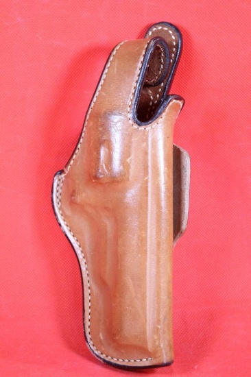 Bianchi #5 BHL brown leather right handed snap holster for S&W K 4". Used in nice condition.