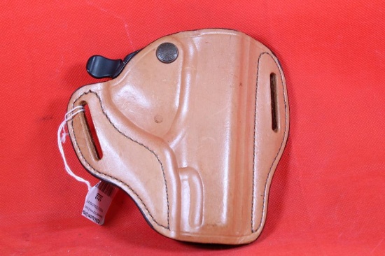 Bianchi #82 Lt brown leather right handed belt holster with trigger release for 1911. Like new.