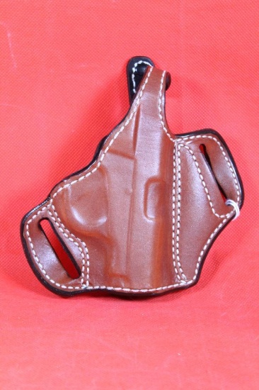 De Santis brown leather right handed snap belt holster for 1911 or similar automatics. Like new.